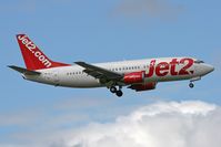 TF-ELO @ EGNT - Boeing 737-33A(QC) on approach to Newcastle Airport in 2006. - by Malcolm Clarke
