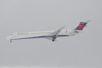 N902DA @ KCVG - Final approach for Rwy 27 in the midst of a winter storm.