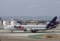 N572FE @ KLAX - MD-11F - by Mark Pasqualino