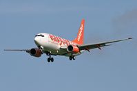 G-EZKG @ EGNT - Boeing 737-73V on approach to Rwy 25 at Newcastle Airport in 2006. - by Malcolm Clarke