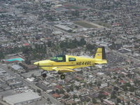 N6446L - Flying over South central area in Los Angeles. Photo by M Koba