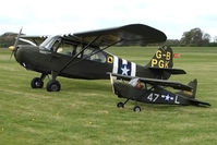 G-BPGK @ EGBO - Little and large !! - Aeronca 7AC and Flying model of Stinson Sentinel parked next to each other at - by Terry Fletcher