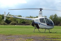 G-EFOF @ EGBD - 2004 Robinson Helicopter Co Inc ROBINSON R22 BETA at Derby Eggington - by Terry Fletcher