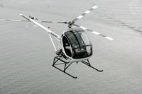 N380MC - over lake - by michael fierros