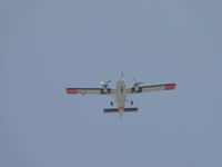 76-22566 @ ONT - US Navy UV-18A, also registered as N83NX, departing runway 26L - by Helicopterfriend