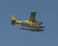 N76TG @ NASSAU - East bound over Nassau Harbour - by Simon Duck