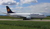 D-ABXR @ LOWG - LH 733; notice the waving pilot