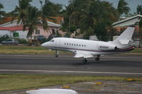N232QS @ TNCM - N232QS landing at TNCM runway 10 - by Daniel Jef