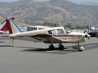 N9841W @ POC - Tied down in transient parking - by Helicopterfriend
