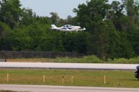 N654DM @ LAL - Arriving at Lakeland, FL during Sun N Fun 2010.