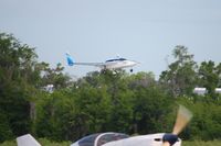 N244FM @ LAL - Arriving at Lakeland, FL during Sun N Fun 2010. - by Bob Simmermon