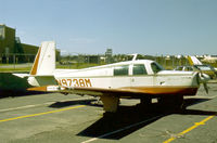 N9738M @ FRG - Mooney M.20C Mk.21 parked at Republic Airport on Long Island in the Summer of 1977. - by Peter Nicholson