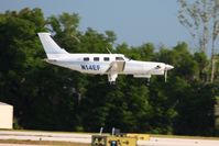 N14EF @ LAL - Arriving at Lakeland, FL during Sun N Fun 2010. - by Bob Simmermon