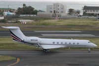 N531QS @ TNCM - N531QS holding at Alpha for take off