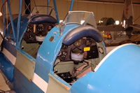G-AJHS @ EHSE - View inside the cockpits of this Tiger Moth, parked in the Flying Museum at Seppe airfield, the Netherlands. - by Henk van Capelle