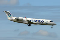 S5-AAJ @ EGBB - Adria CLRJ on charter into Birmingham - by Terry Fletcher