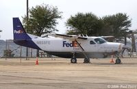 N855FE @ MQI - Quietly awaiting her next loadout - by Paul Perry