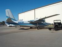 N313M @ KMHV - Parked between some hangars - by ghans