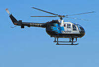 N8118Y @ KCCR - CALSTAR 1989 BO105LS in transition - by Steve Nation