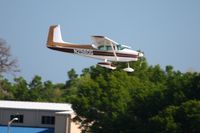 N2560G @ LAL - Landing on 9 during Sun N Fun 2010 at Lakeland, FL. - by Bob Simmermon