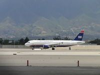 N127UW @ ONT - Rolling out after landing on runway 26R - by Helicopterfriend
