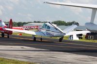 N390HW @ LAL - In line to depart Lakeland, FL during Sun N Fun 2010 - by Bob Simmermon