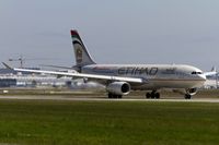 A6-EYP @ EDDF - departing via RW18W - by Friedrich Becker