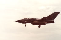 ZA409 @ EGQS - Tornado GR.1, callsign Magnum 3, of the Tactical Weapons Conversion Unit at RAF Honington landing at RAF Lossiemouth in the Summer of 1991. - by Peter Nicholson