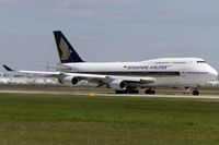 9V-SPJ @ EDDF - departing via RW18W - by Friedrich Becker
