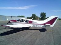 N6645V @ KAXN - On the line. Sorry for the poor quality, this photo was taken with my cell phone.