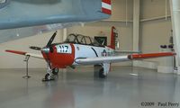 N56NT @ 42VA - Tucked in the corner of the Navy Hangar - by Paul Perry