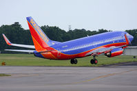 N450WN @ ORF - Southwest Airlines N450WN (FLT SWA881) departing RWY 23 enroute to Baltimore/Washington Int'l (KBWI).
