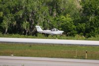 N4327E @ LAL - Arriving at Lakeland, Florida during Sun N Fun 2010. - by Bob Simmermon