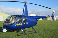 G-PIXL @ X5FB - Robinson R44 Raven ll at Fishburn Airfield, UK in 2009. - by Malcolm Clarke
