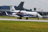 N264FX @ LAL - Departing Lakeland, Florida during Sun N Fun 2010 - by Bob Simmermon