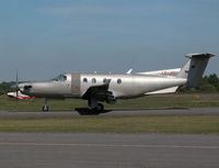LX-JFI @ EGLK - DRAB LOOKING PC-12 TAXYING PAST THE CAFE - by BIKE PILOT