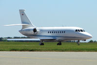 G-CGHI @ EGGW - Falcon 2000 at Luton on a hot summers day - by Terry Fletcher