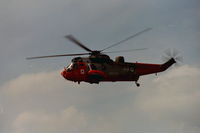 XV666 @ EGFH - RNAS Culdrose rescue Sea King HAR.5 helicopter coded 823/CU of 771 NAS departing Swansea Airport after taking on fuel. Summer 2001 - by Roger Winser