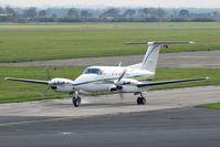 G-BYCP @ EGNV - Beech B200 Super King Air on the taxi way to 23 for take-off at Durham Tees Valley Airport in 2005. - by Malcolm Clarke