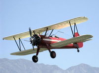 N66711 @ SZP - 1941 Boeing Stearman IB75A, originally a PT-17, Jacobs R-755B2 275 Hp, Restricted, Experimental class, newly rebuilt, re-covered, stunning refinish by Rowena's Flying Fabric Company at SZP, on final Rwy 22 - by Doug Robertson