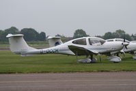 G-OCCM @ EGTC - DA40D, c/n: D4.238 - by Trevor Toone