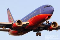 N614SW @ LAX - Southwest Airlines N614SW (FLT SWA2329) from Salt Lake City Int'l (KSLC) on short-final to RWY 24R. - by Dean Heald