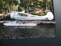 N145V @ LAKE - Curriers Flying Service.
Photo taken during Sea Plane Fly-In, Moosehead Lake , Greenville , Maine

Scan from photo taken in Sep 1997 - by Henk Geerlings