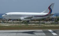N733TW @ TNCM - N733TW over the lines at TNCM runway 10