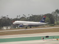 N602AW @ LAX - Almost touching down on runway 24R - by Helicopterfriend
