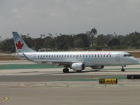 C-FHKI @ LAX - Taxiing towards runway 24L - by Helicopterfriend