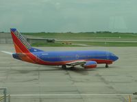 N690SW @ MCI - Taxiing to runway 19R - by Helicopterfriend