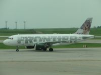 N929FR @ MCI - The Cat is taxiing to their terminal - by Helicopterfriend
