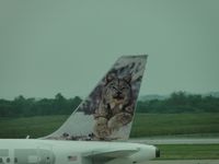 N929FR @ MCI - Frontier tail CAT - by Helicopterfriend