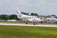 YV2021 @ LAL - Departing Lakeland, Florida during Sun N Fun 2010. - by Bob Simmermon